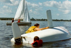 A dinghy requires the weight of the skipper/crew to keep the boat upright and prevent it from capsizing.